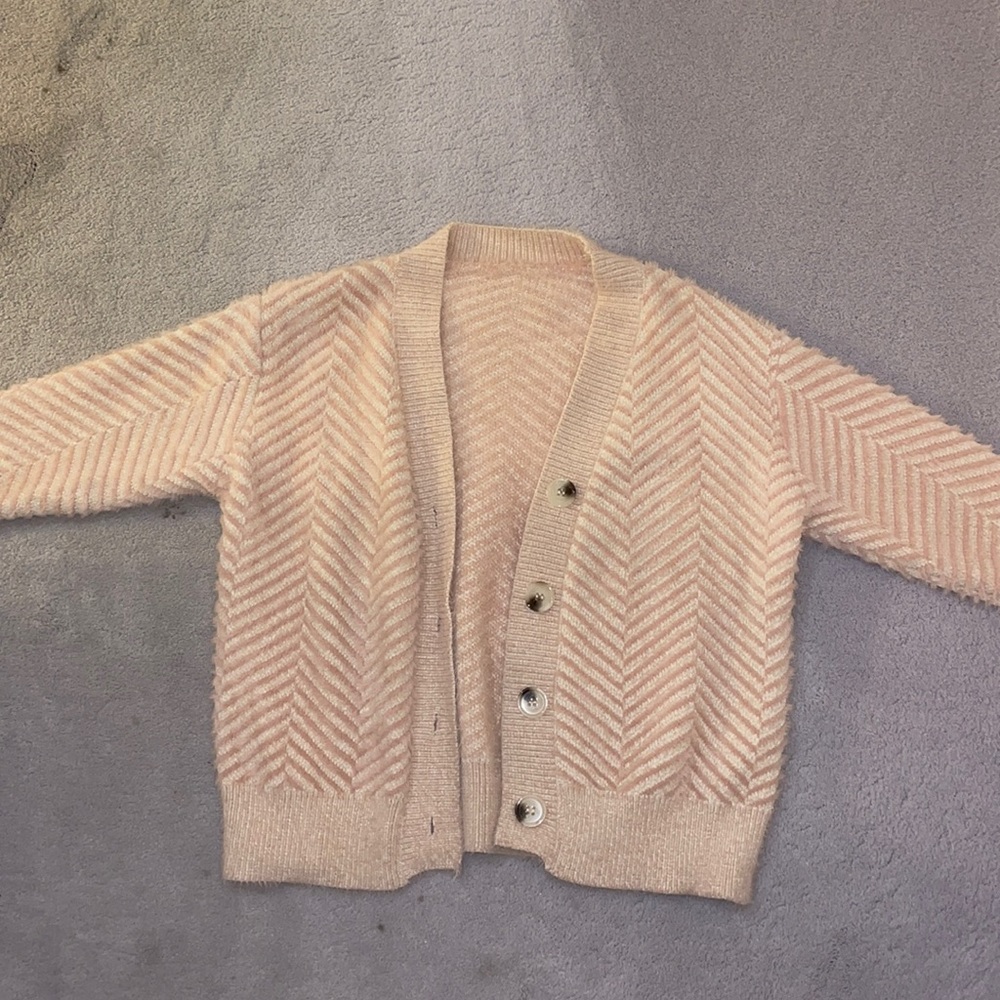 Fuzzy pink and white Chevron print sweater.